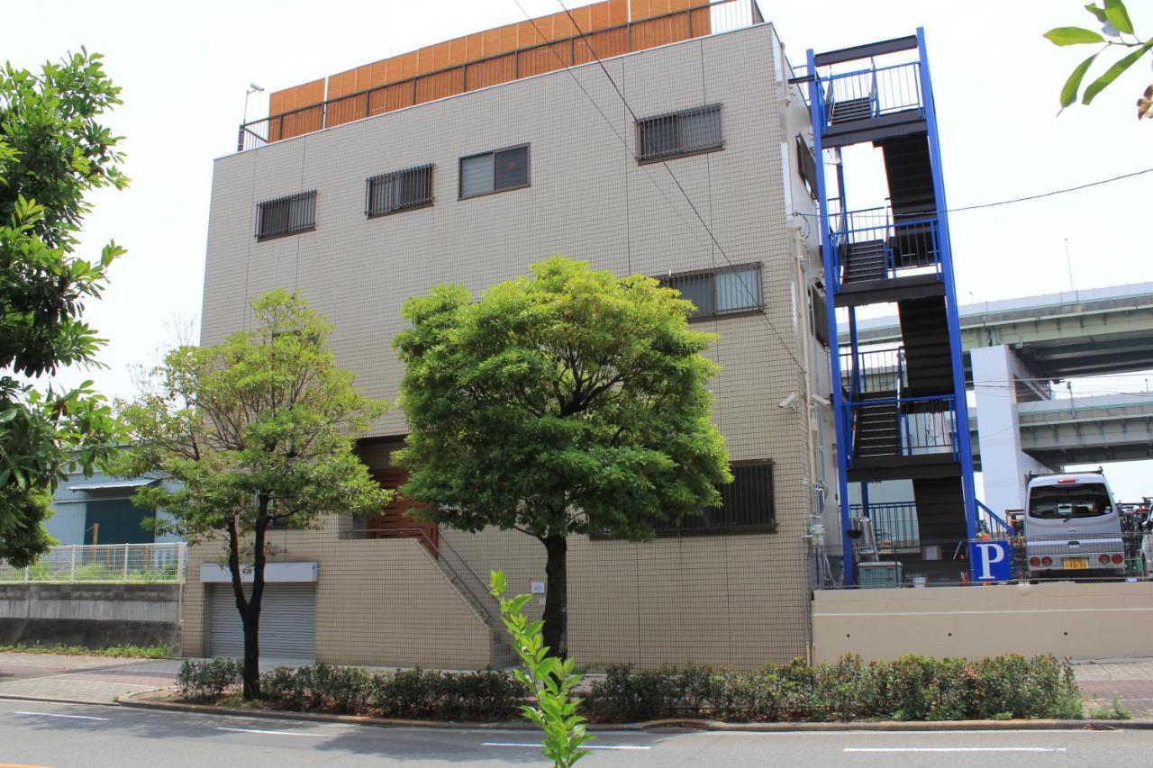 Guest House Apple โอซาก้า ภายนอก รูปภาพ