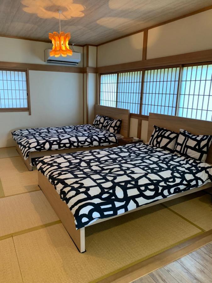 Guest House Apple โอซาก้า ภายนอก รูปภาพ