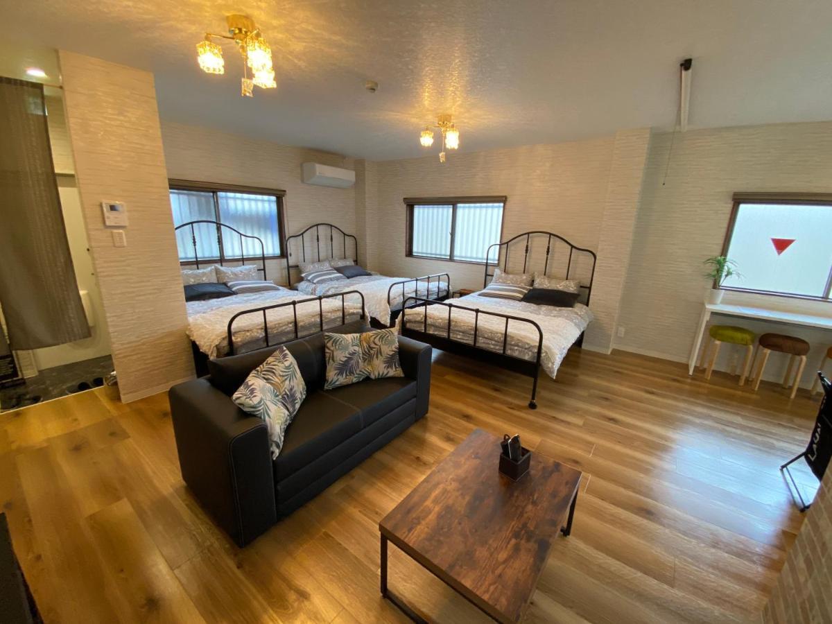Guest House Apple โอซาก้า ภายนอก รูปภาพ