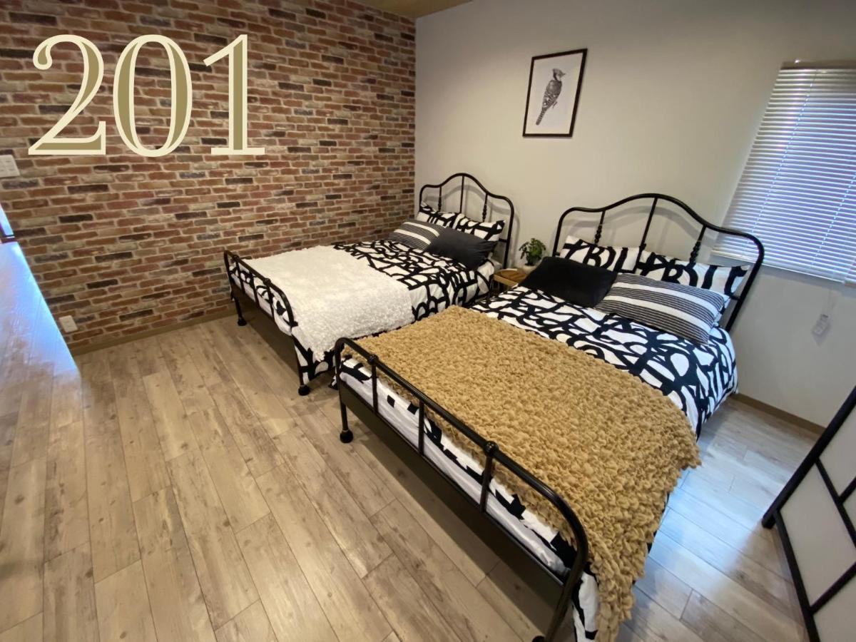 Guest House Apple โอซาก้า ภายนอก รูปภาพ