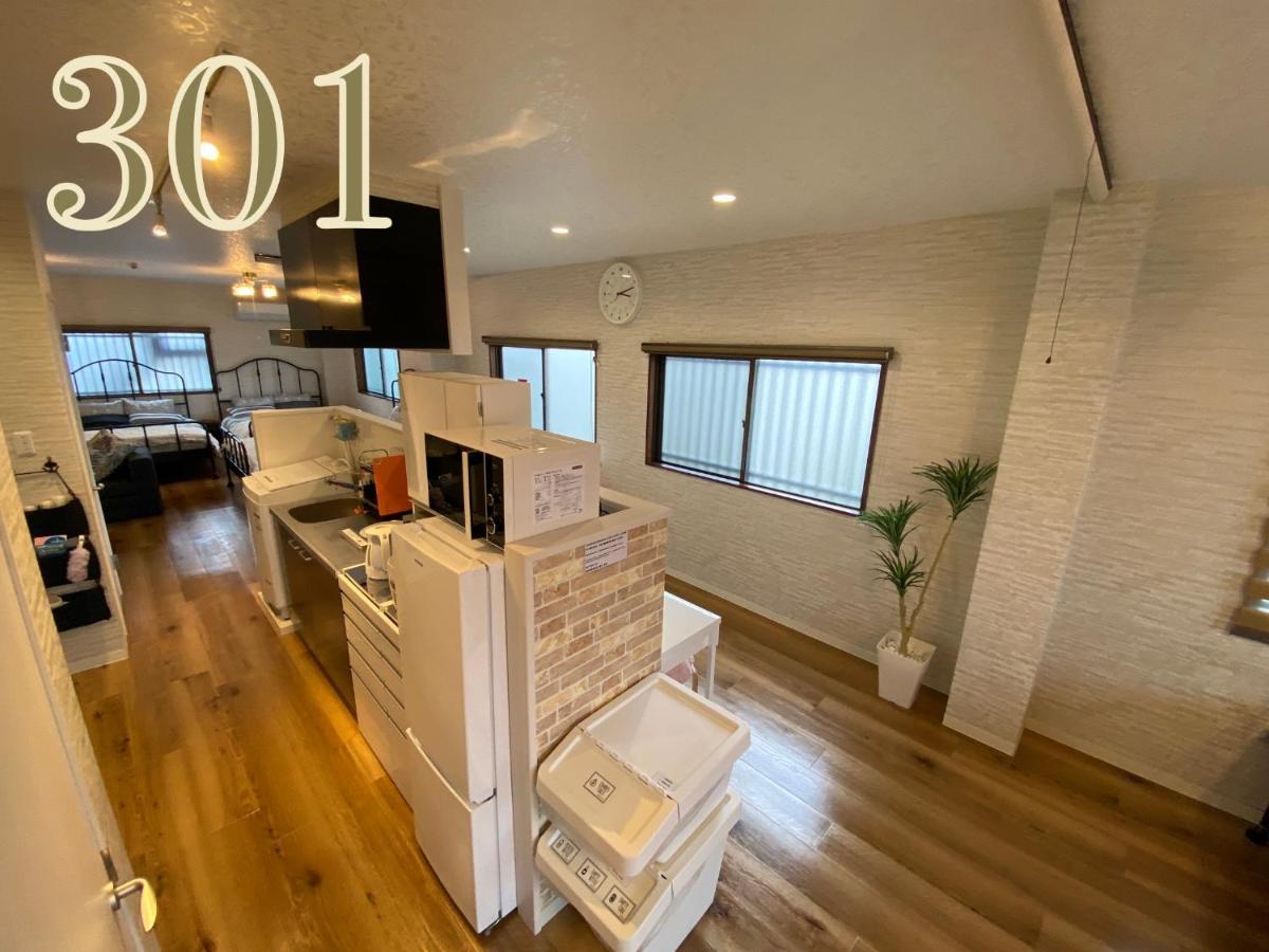 Guest House Apple โอซาก้า ภายนอก รูปภาพ
