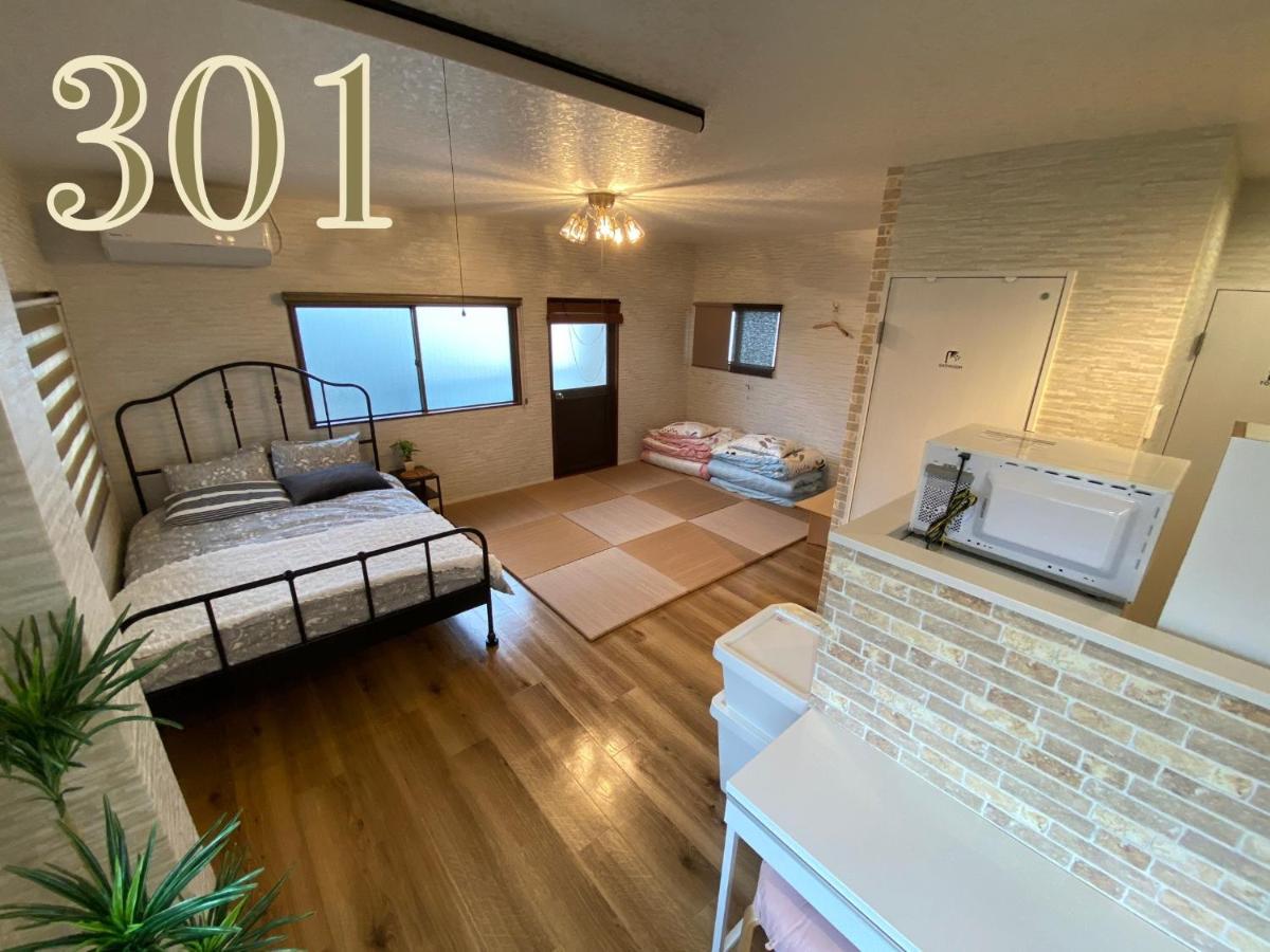 Guest House Apple โอซาก้า ภายนอก รูปภาพ
