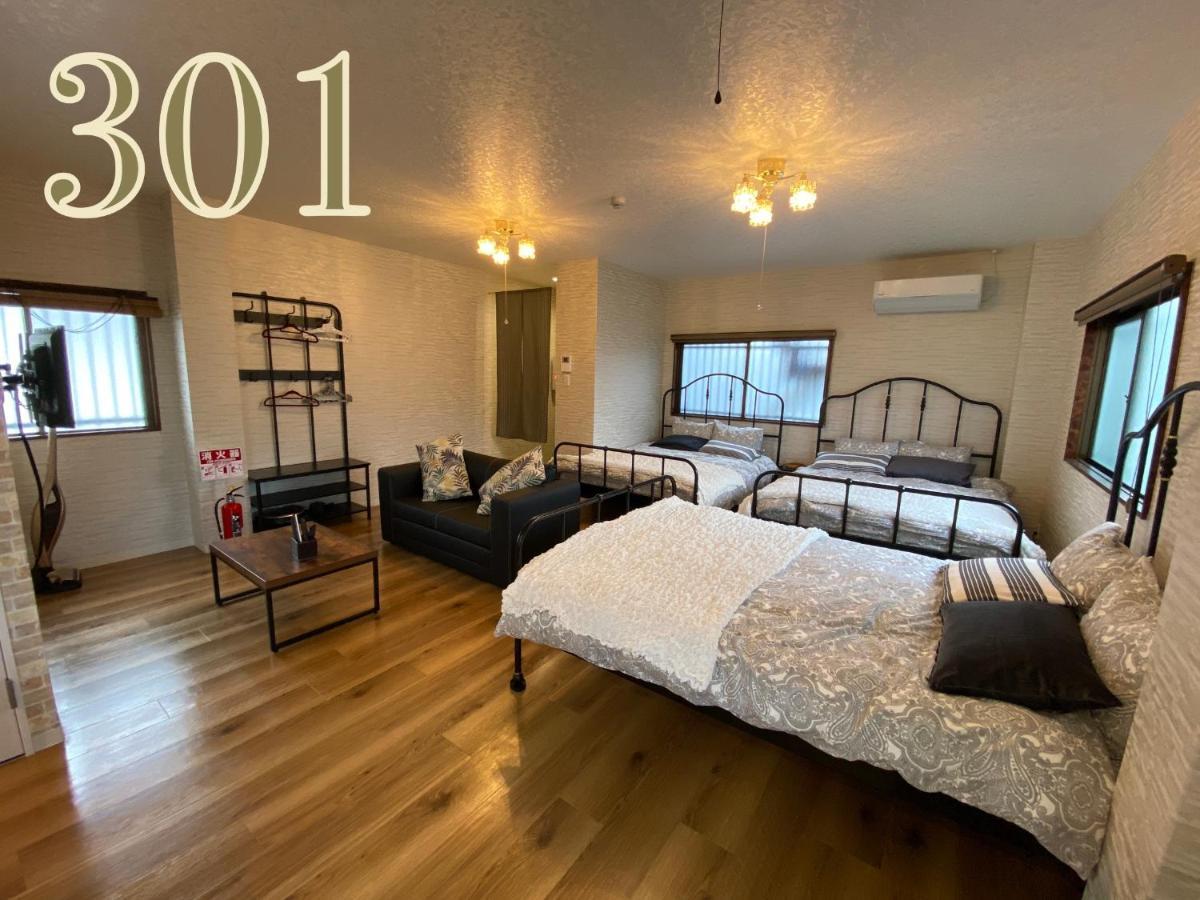 Guest House Apple โอซาก้า ภายนอก รูปภาพ